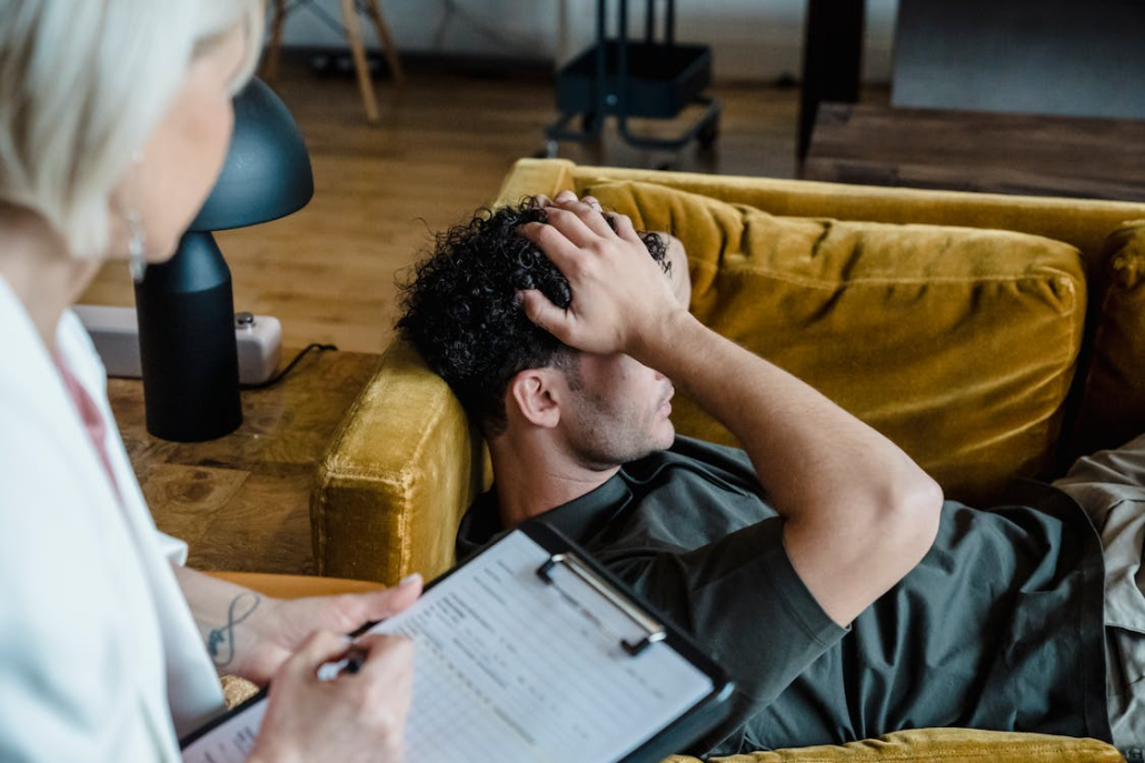 a man stressed out during a therapy session