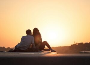 A couple watching the sunset after getting sex addiction treatment in Idaho