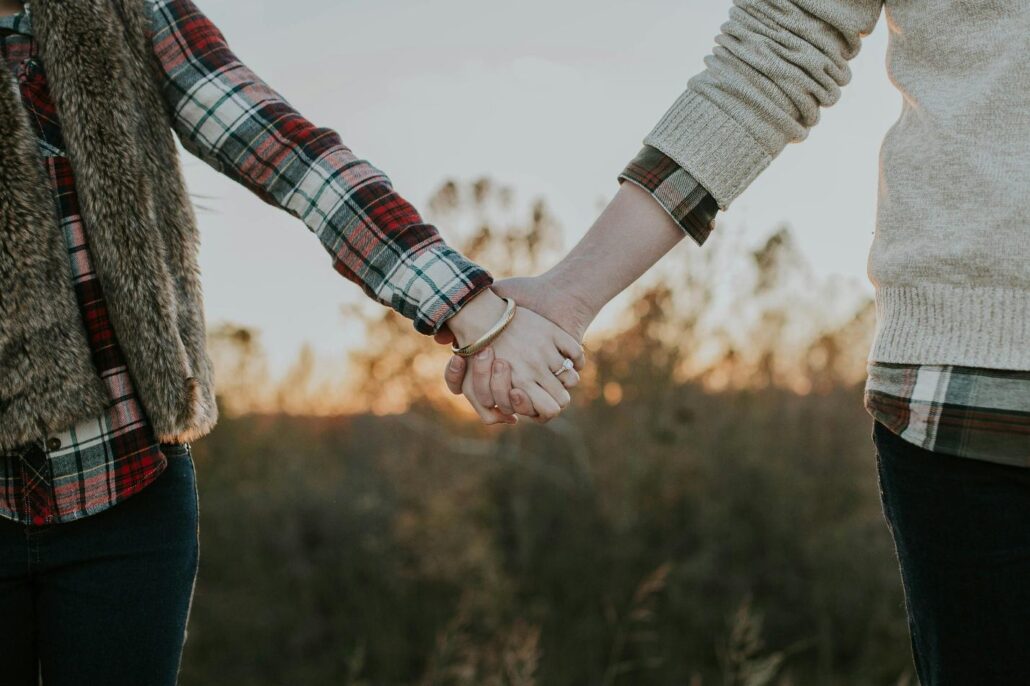 A couple holding hands at an addiction treatment center Idaho