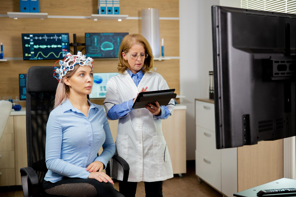 Therapist reviewing clinical research and brain scan images related to compulsive sexual behavior