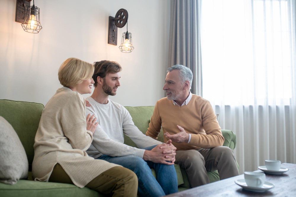 Family member comforting a loved one during a supportive conversation at home